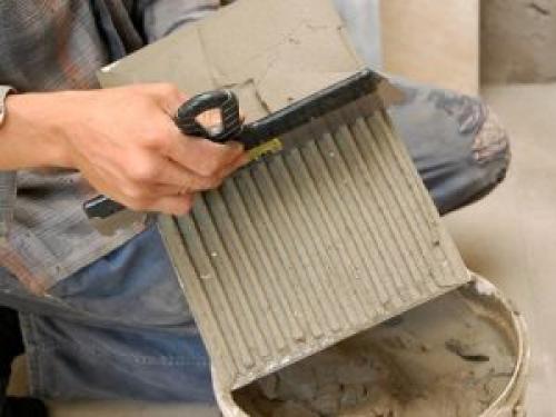 Укладка плитки на кирпичную стену. Как положить плитку на кирпичную стену?