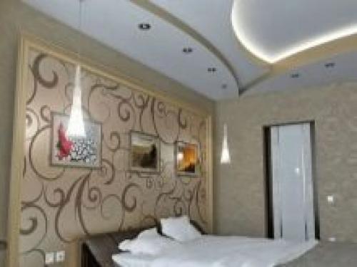 Потолки из гипсокартона в зале. Типы конструкций гипсокартонных потолков 15