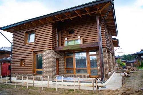 Дизайн фасада комбинированного дома в деталях. Комбинированные дома — стили, варианты архитектуры, лучшие проекты и эксклюзивный дизайн (135 фото и видео) 38 Дизайн фасада комбинированного дома в деталях. Комбинированные дома — стили, варианты архитектуры, лучшие проекты и эксклюзивный дизайн (135 фото и видео) 38