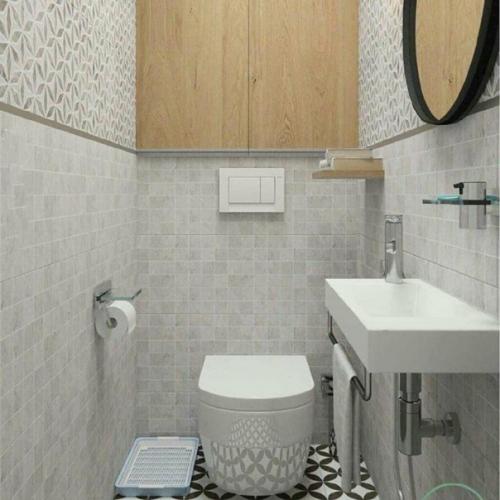 Интерьер небольшого санузла, несмотря на ограниченное пространство, может выглядеть по-разному исходя из цвета сантехники, отделки и материалов. 07