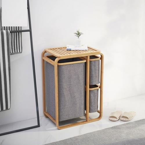 Корзина для белья - заметный предмет в интерьере, поэтому важно подобрать ее в стиле ванной комнаты. 01