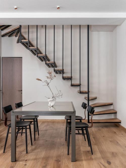 Дизайн этого дома следует принципам минимализма, где меньше - значит больше. 01