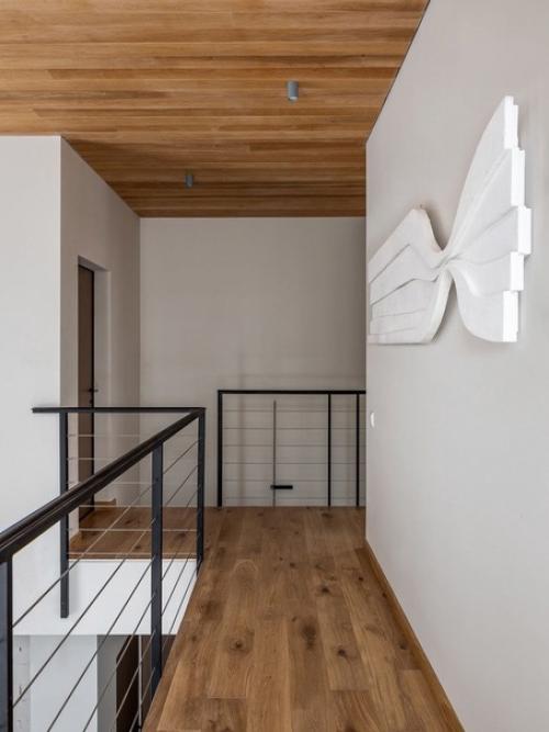 Дизайн этого дома следует принципам минимализма, где меньше - значит больше. 07