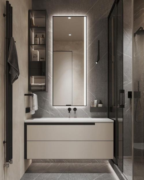 Стильный и современный интерьер санузла, пркимущественно в серых оттенках и в тёмном исполнении. 01
