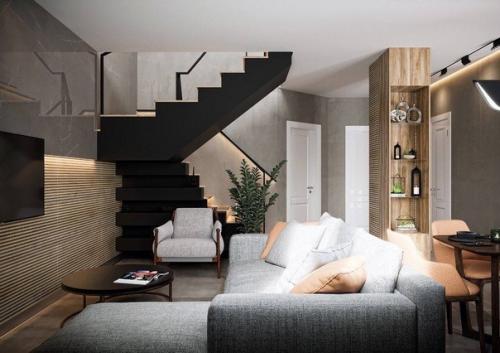 Интерьер загородного дома со стильным современным сочетанием оттенков и декором. 04