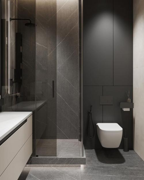 Стильный и современный интерьер санузла, пркимущественно в серых оттенках и в тёмном исполнении. 02