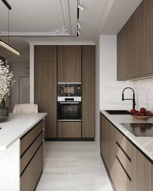 Достаточно сдержанная и минималистичная, но совсем не простая кухня. 02