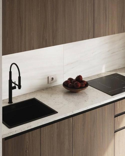 Достаточно сдержанная и минималистичная, но совсем не простая кухня. 04