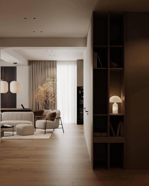 Интерьер кухни - гостиной в тёплых оттенках, тёмные приглушенные оттенки и мягкий свет создают атмосферу спокойствия и умиротворения. 05