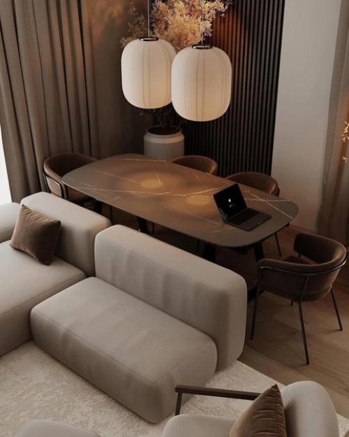 Интерьер кухни - гостиной в тёплых оттенках, тёмные приглушенные оттенки и мягкий свет создают атмосферу спокойствия и умиротворения. 03