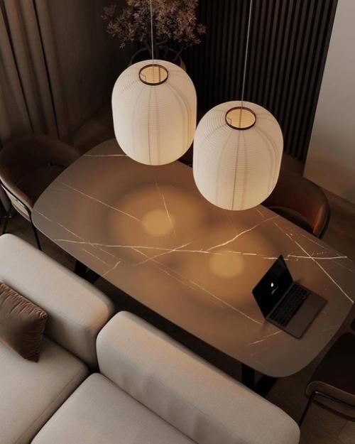 Интерьер кухни - гостиной в тёплых оттенках, тёмные приглушенные оттенки и мягкий свет создают атмосферу спокойствия и умиротворения. 06