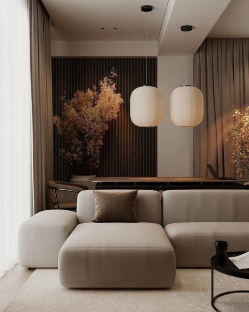 Интерьер кухни - гостиной в тёплых оттенках, тёмные приглушенные оттенки и мягкий свет создают атмосферу спокойствия и умиротворения. 01