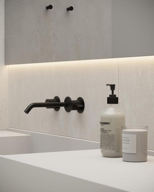 Монохромные поверхности и минималистичные формы в сочетании с контурной подсветкой и заливающий светом придают дизайну санузла футуризм. 03