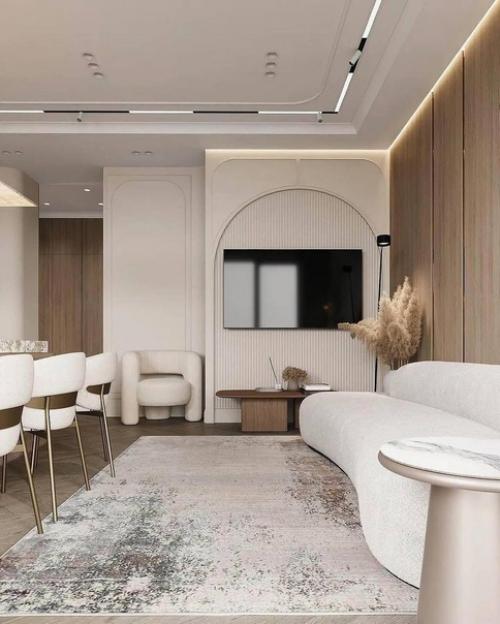 Планировку специально сделали так, развернув диван в центр комнаты. 04