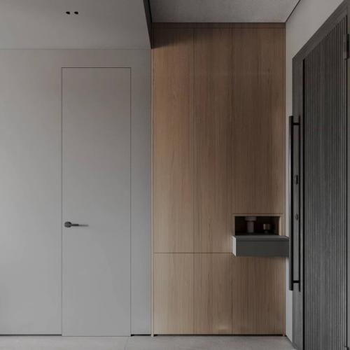 Серый минимализм в сочетании с тёплым деревом создает уютную современную обстановку в квартире. 05