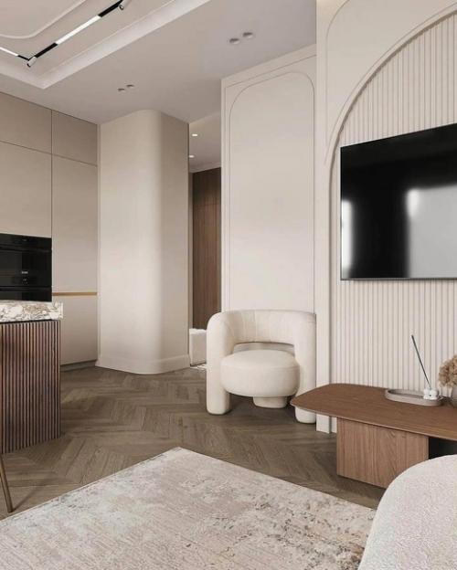 Планировку специально сделали так, развернув диван в центр комнаты. 06