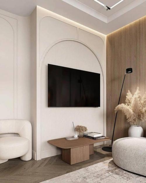 Планировку специально сделали так, развернув диван в центр комнаты. 03