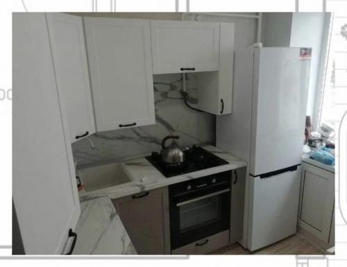 Руками волонтеров кухню старушке обновили. 02