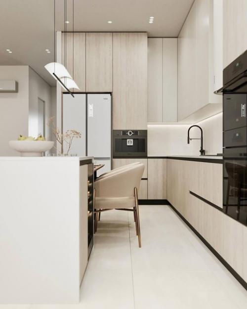 Светлый интерьер просторной кухни - гостиной в спокойных монохромных тонах. 07