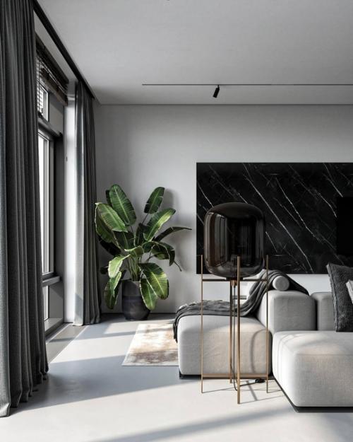 Интерьер лаконичной просторной квартиры в серых тонах для любителей монохромных интерьеров. 01