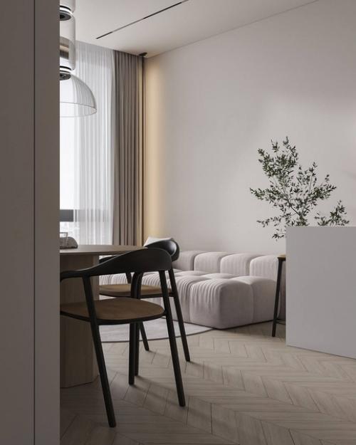 Гостиная в небольшой квартире, площадью 60 квадратных метров, с уютным интерьером предназначена для семьи из трех человек. 02