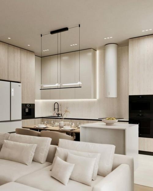 Светлый интерьер просторной кухни - гостиной в спокойных монохромных тонах. 02