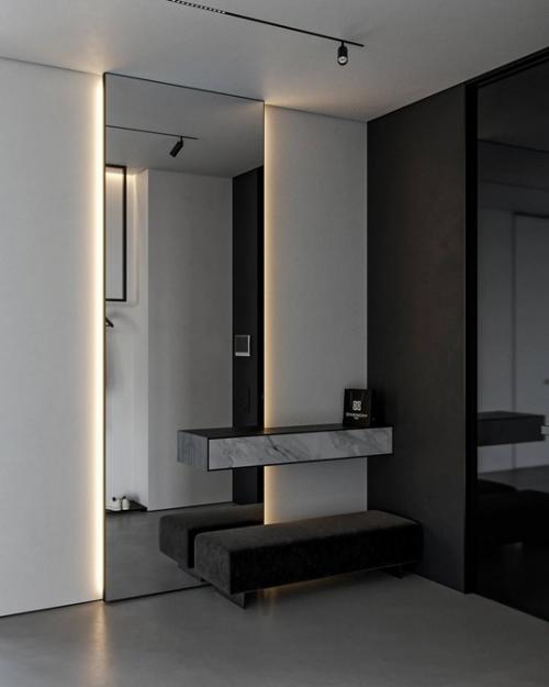 Интерьер лаконичной просторной квартиры в серых тонах для любителей монохромных интерьеров. 06