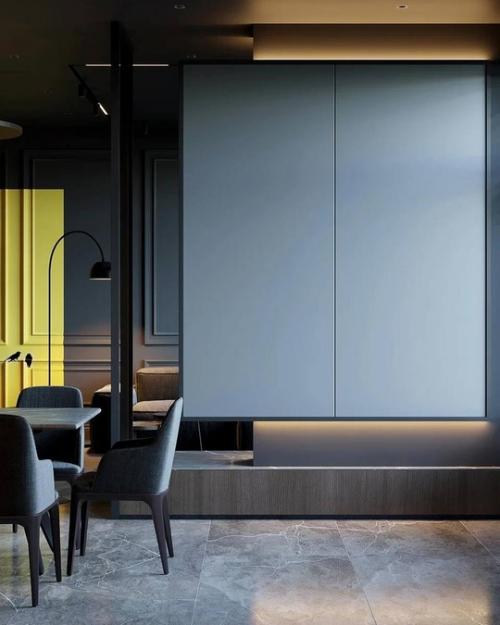 Строгий интерьер просторной кухни - гостиной в монохромных тонах. 09