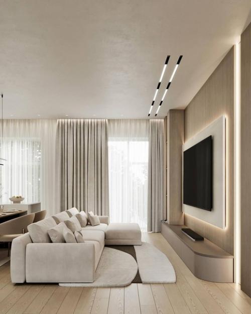 Светлый интерьер просторной кухни - гостиной в спокойных монохромных тонах. 08