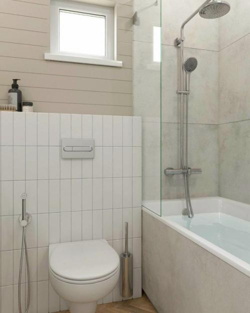 Минимализм, который работает на уют: в этой ванной комнате нет ничего лишнего, только чистые линии, естественные оттенки и продуманные детали. 05