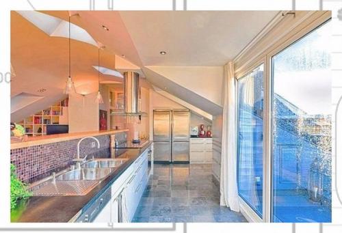 Эта просторная квартира на последнем этаже в Стокгольме поражает своими размерами (155 кв. 03