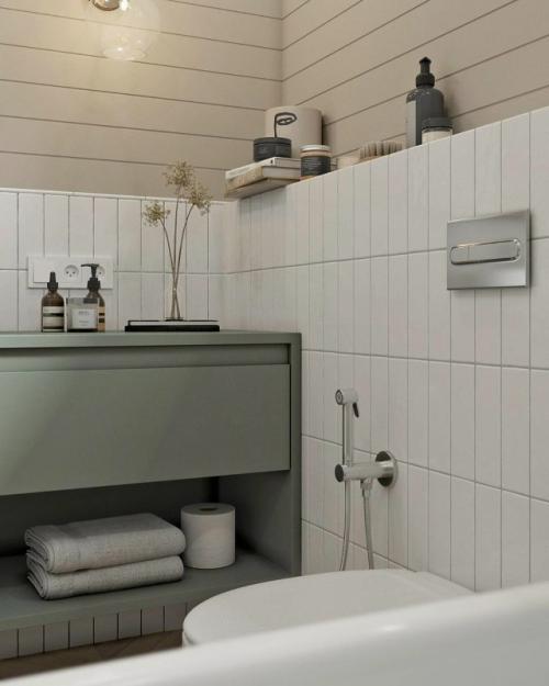 Минимализм, который работает на уют: в этой ванной комнате нет ничего лишнего, только чистые линии, естественные оттенки и продуманные детали. 06