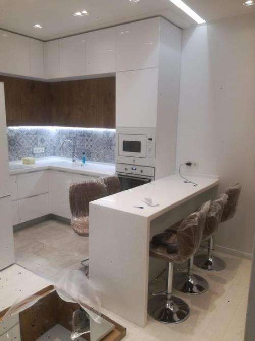 У нас совсем недавно закончили ремонт. 03