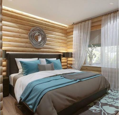 Дизайн - проект бревенчатого дома выполнен лаконично, стильно и в современном ключе. 02