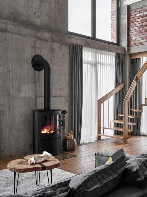 Загородный дом.  Интерьер, в котором бетон и кирпич без отделки соседствуют с минималистской мебелью и уютным текстилем. 01