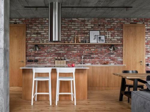 Загородный дом.  Интерьер, в котором бетон и кирпич без отделки соседствуют с минималистской мебелью и уютным текстилем. 02