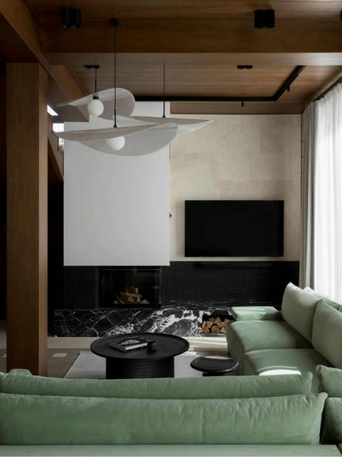 Этот дом сочетает в себе уют натуральных материалов и эстетику современного дизайна. 04