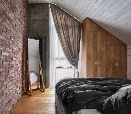 Загородный дом.  Интерьер, в котором бетон и кирпич без отделки соседствуют с минималистской мебелью и уютным текстилем. 04