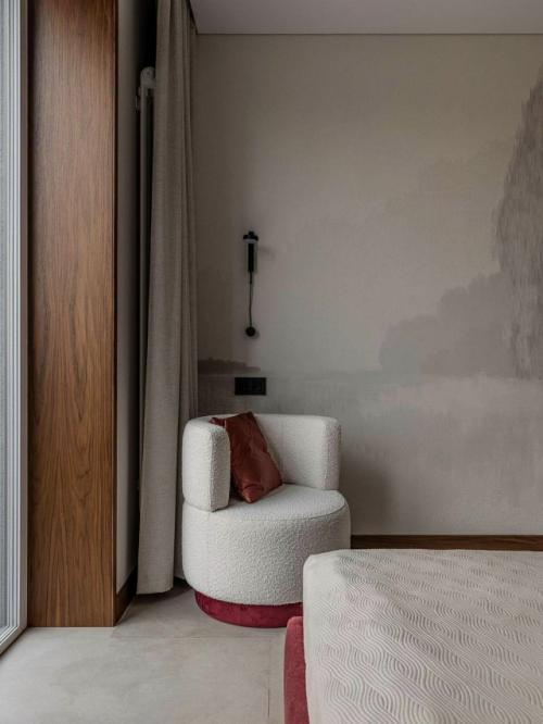 Стильный и лаконичный, этот дом демонстрирует, как можно создать по-настоящему уютное пространство без излишней декоративности. 01