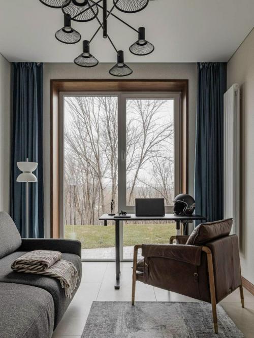 Стильный и лаконичный, этот дом демонстрирует, как можно создать по-настоящему уютное пространство без излишней декоративности. 04