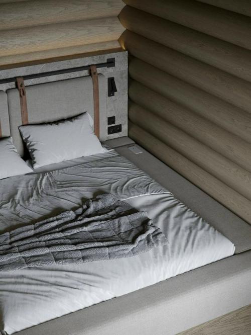 Интерьер, который сочетает в себе уют природных материалов и эстетику лаконичного дизайна. 03