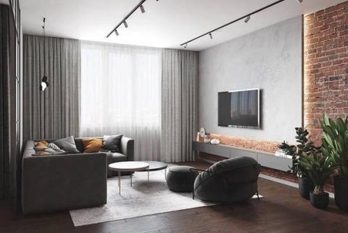 Современный интерьер просторной кухни - гостиной с насыщенным ярким фартуком. 05