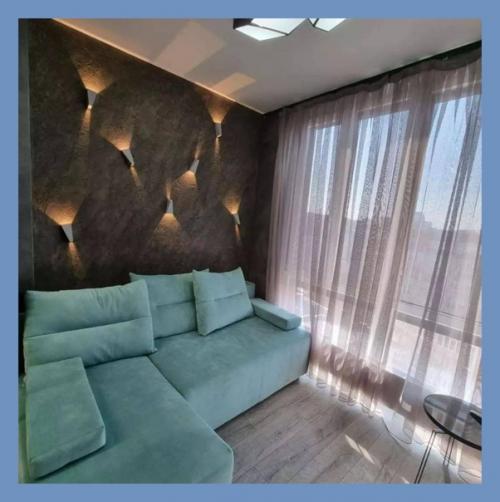 Двухкомнатная студия.  Без дизайнера не обошлось, но оно того стоило. 01