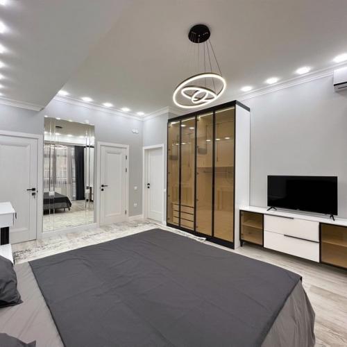 Шикарная 4-х комнатная квартира студия с новой мебелью и бытовой техникой. 05