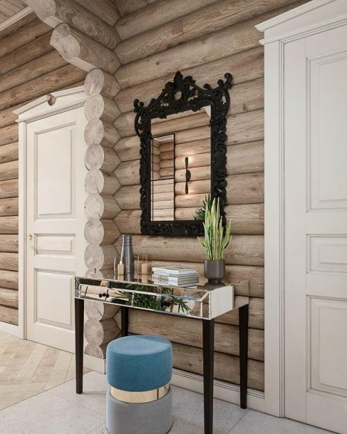 Удивительно гармоничное пространство, где современный интерьер мягко переплетается с природной фактурой бревенчатых стен.  