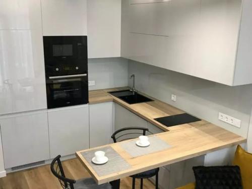 Кухня - студия и спальня после ремонта. 02