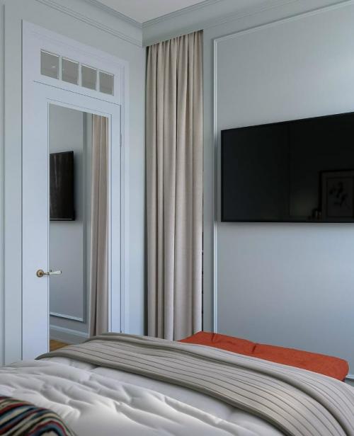 Интерьер сочетает классическую основу и современные акценты, создавая пространство, в котором легко жить, творить и отдыхать. 03