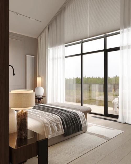 Уютная просторная мастер - спальня с панорамным остеклением и выходом на балкон. 02