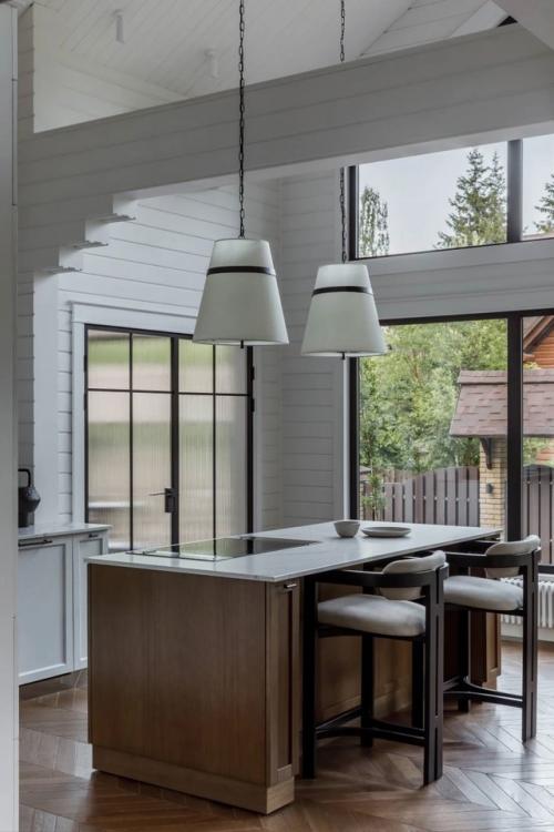 Скандинавский минимализм проявляется здесь во всей своей сдержанной красоте: ничего лишнего, только простота, чистота и продуманный уют. 02