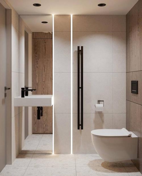 Светлый современный интерьер просторной ванной комнаты с душевой кабиной. 02